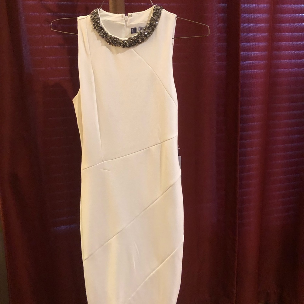 White J Lo dress; great for a Christmas party